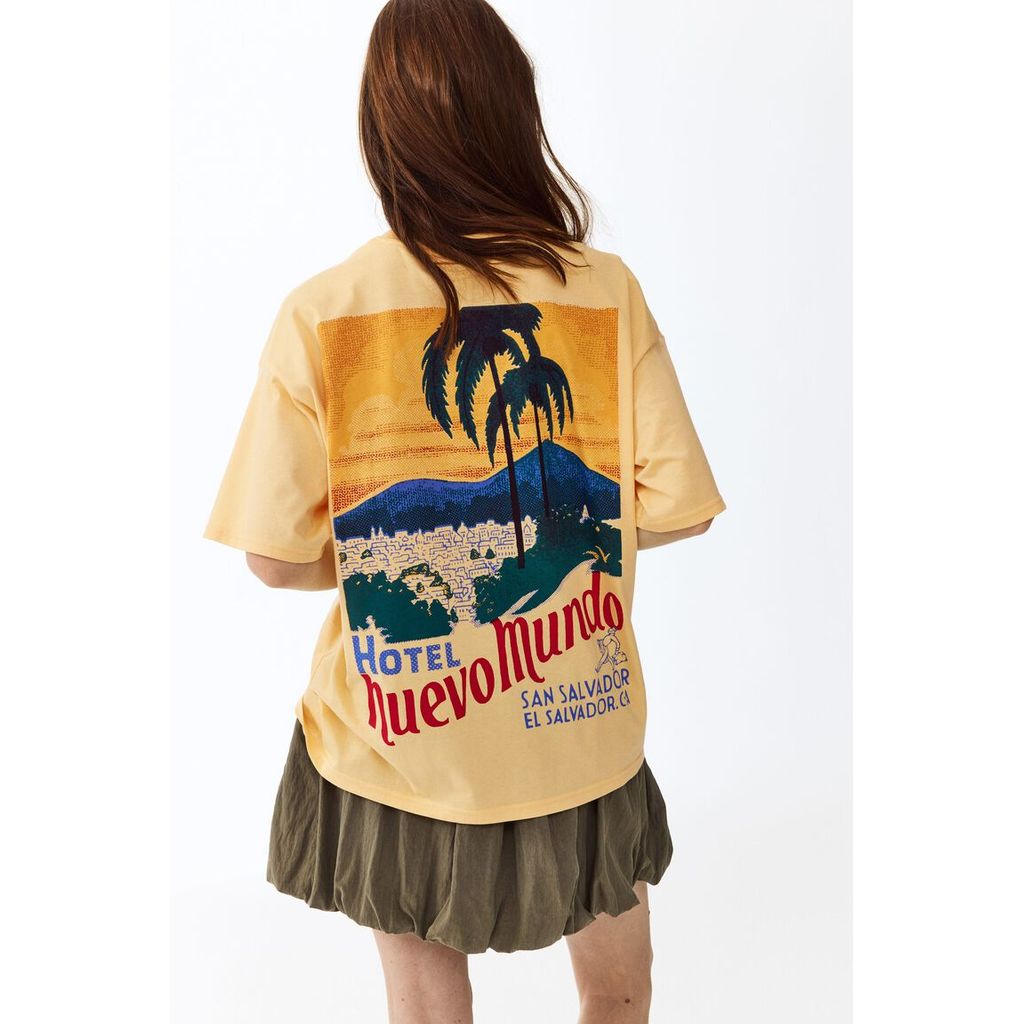 Foto H&M H&M Wanita T-shirt oversized dengan cetakan 1341688_0